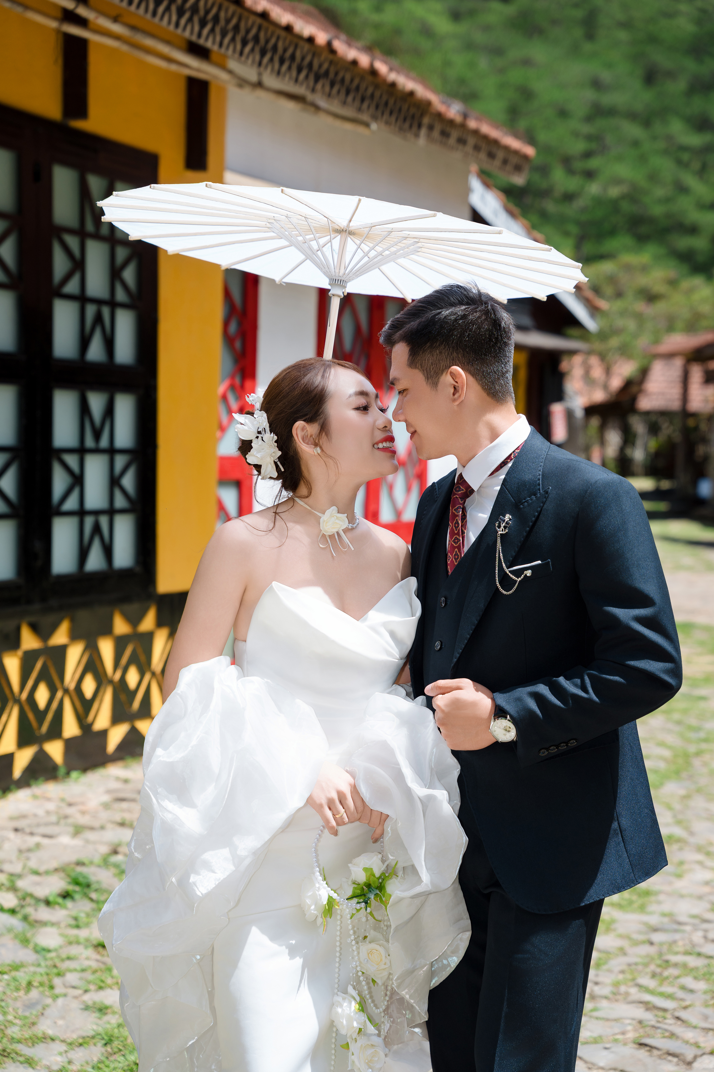 The couple posing together in a warm atmosphere